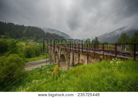 Old Austrian Stone Railway Bridge Viaduct In Vorohta.   Ukraine