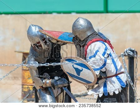 Goren, Israel, April 06, 2018 : Two Knights - Participants In The Knight Festival Are Fighting On Th