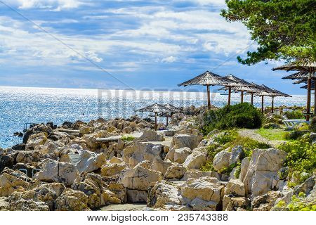 Croatian Seaside Restaurant Terrace With Deliscious Seafood At Rab Island.