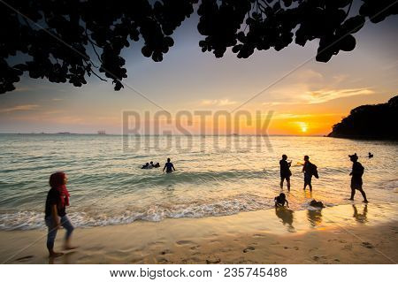 Lumut Perak, Malaysia - March 20, 2018: People Swimming At Beach Of Teluk Batik. Teluk Batik Beach I