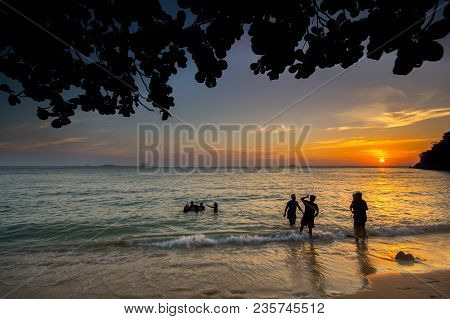Lumut Perak, Malaysia - March 20, 2018: People Swimming At Beach Of Teluk Batik. Teluk Batik Beach I
