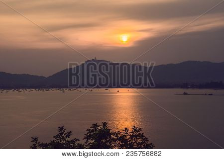 Sunset Over The Sea And The Island Of Phuket, Thailand.