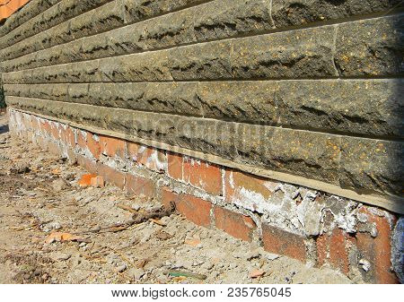 Mineral Efflorescence On The Foundation House Wall. Efflorescence Mean As An Indicator Of Moisture P
