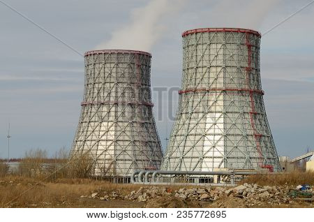 Large Cooling Pipes At The Thermal Power Plant.inside Them Steam Is Cooled And Condensed Water.
