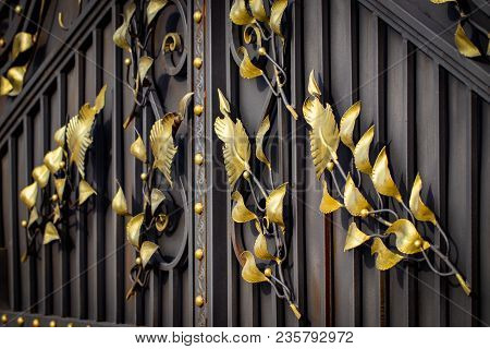 Details, Structure And Ornaments Of Forged Iron Gate. Floral Decorative Ornament, Made From Metal. V