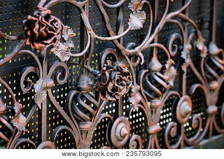 Details, Structure And Ornaments Of Forged Iron Gate. Floral Decorative Ornament, Made From Metal. V