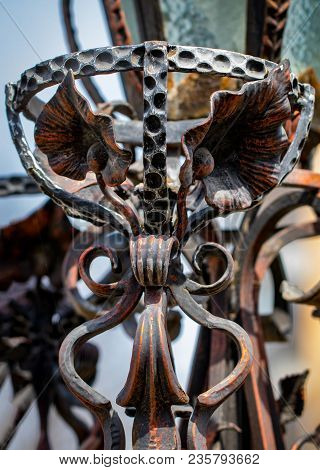 Details, Structure And Ornaments Of Forged Iron Gate. Floral Decorative Ornament, Made From Metal. V