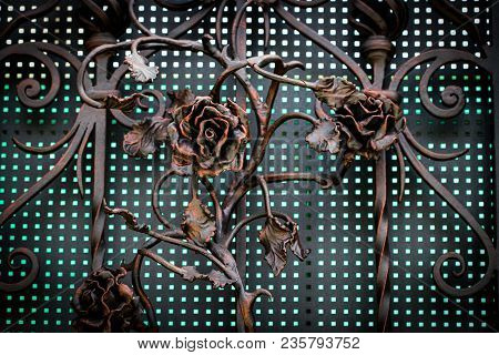 Details, Structure And Ornaments Of Forged Iron Gate. Floral Decorative Ornament, Made From Metal. V