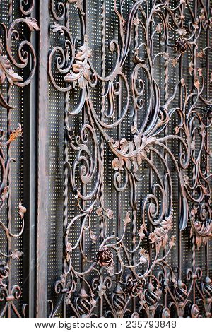 Details, Structure And Ornaments Of Forged Iron Gate. Floral Decorative Ornament, Made From Metal. V