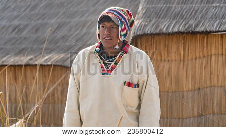 Puno, Peru - September 2017: Unidentified Man At The Floating Island Isla Flotante, Titicaca Lake, P