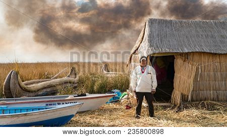 Puno, Peru - September 2017: Unidentified Man At The Floating Island Isla Flotante, Titicaca Lake, P
