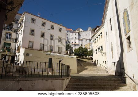 San Miguel Staircases Amongst Old Buildings In Alfama Disctrict, The Most Famous And Ancient Typical