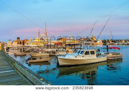 Provincetown, Ma, Usa - August 12 2017: Ships And Boats In The Provincetown Marina During Sunset.
