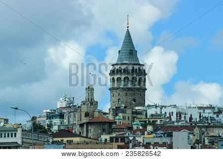 Frontal View Of Galata Tower And Cityscape Of Istanbul With A Purple Filter Applied.