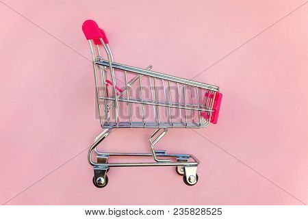Small Supermarket Grocery Push Cart For Shopping Toy With Wheels And Pink Plastic Elements On Pink P