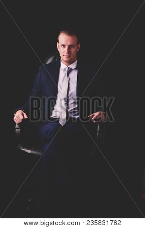 Concept Business People. Businessman On The Background. Businessmen Look Dastardly. Businessmen Show