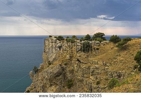 View From The Top Of Cape Alchak Towards The Sea. Summer, Overcast. Surroundings Of Sudak, Crimea.