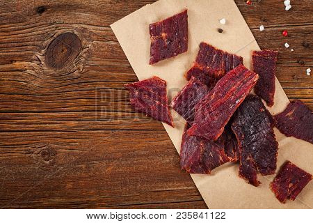 Delicious Homemade Beef Jerky Background. Selective Focus.