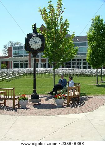 Defiance College Clock Tower With Serrick Center In The Background And Seats Set Up For Graduation C