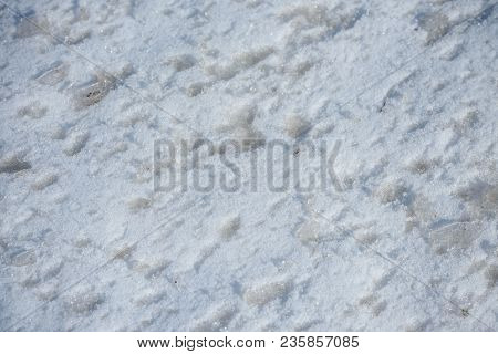 The Texture Of Melting Spring Snow. Background .