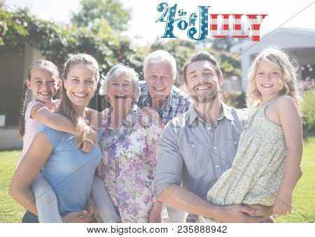 Smilinga merican family in the garden for the 4th of July