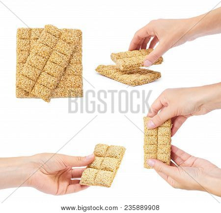 Set Of Different Sesame Brittles Brick With Hand, Isolated On White Background.