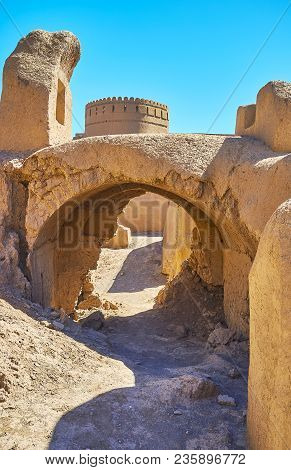 The Watchtower Of Rayen Castle Is Seen Behind The Ruins Of Ancient Adobe Arch Of The Residential Bui