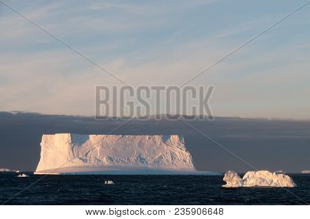Giant Tabular Icebergs Floating In The Weddell Sea, In Antarctica.