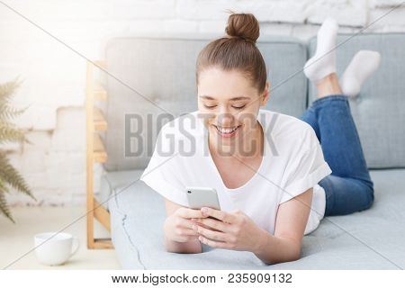 Happy Joyful Smiling Young Woman Using Smart Phone