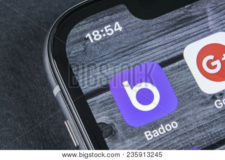 Sankt-petersburg, Russia, April 12, 2018: Badoo Application Icon On Apple Iphone X Screen Close-up. 