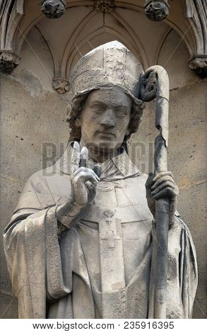 PARIS, FRANCE - JANUARY 05: Saint Remigius, statue on the portal of the Basilica of Saint Clotilde in Paris, France on January 05, 2018.