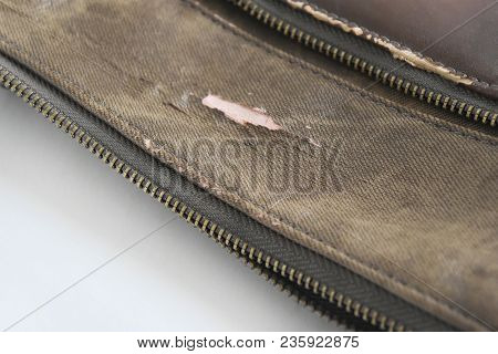Crack Of Brown Leatherette Bag Damage Due To Lifetime. Crack Of Brown Leatherette Bag Damage Due To 