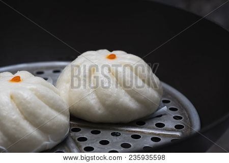 Two Steamed Buns In A Pan