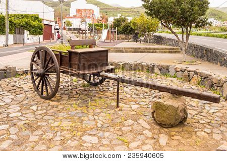 Old Wooden Transport Cart Transformed Into A Flowerpot In Western Tenerife Spain