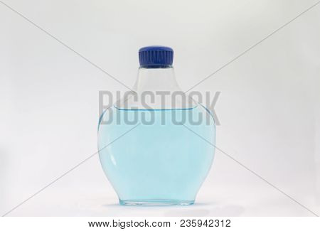 Blue Glass Perfume Bottle, Rounded With Blue Stopper.