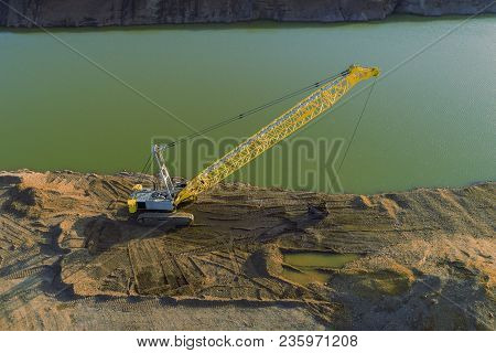 Drone Shot Of A Dredging Crane Near The Water