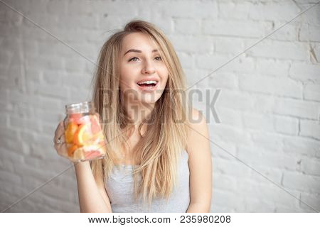 Close-up Happy Woman With Glass Of Fresh Summer Lemonade With Straw. Caucasian Young Girl 20-25 Year
