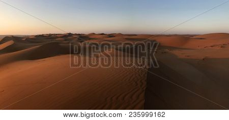 Red Sharqiya Sand Dunes At Sunrise In Oman