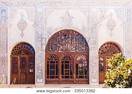 Kashan, Iran, Novemver 10.2016: The Courtyard Of The Tabatabaei House With Large Arched Stained Glas
