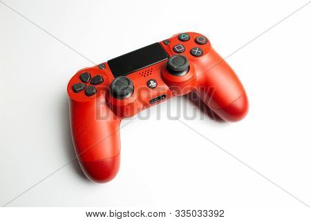 Minsk, Belarus - 22 November, 2019: The New Red Sony Dualshock 4.