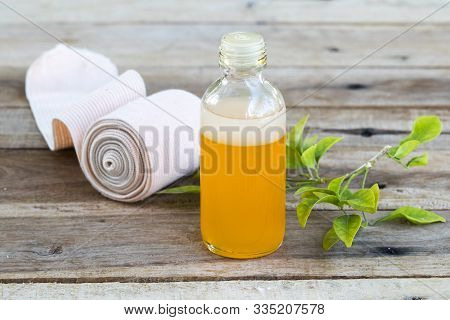 First Aid With Herbal Oil Medication Liniment And Bandage Health Care Pains And Aches For Athlete De