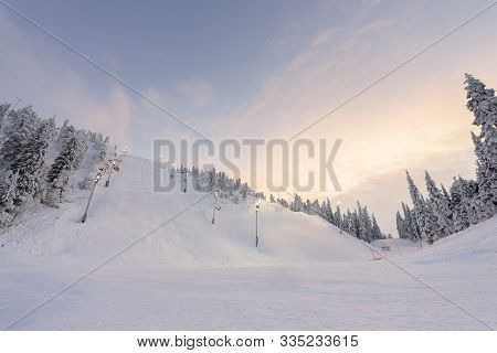 Rukatunturi Ski Jumping Hill In Winter Season And Nice Weather And Blue Sky In Winter Season And Sun