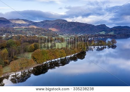 Stunning Aerial Drone Landscape Images Over Coniston Water At Sunrise On Beautiful Autumn Fall Morni