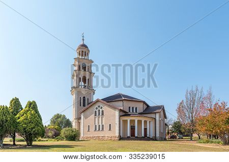 Machadodorp, South Africa - May 22, 2019: A Street Scene, With The Dutch Reformed Church, In Machado