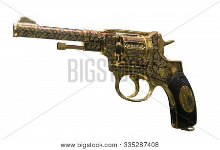 Golden Revolver Of The Nagan System, Made In 1928. Isolated On White