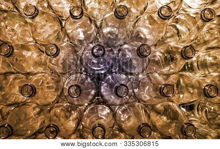 Image Of Stacked Empty Bottles Without Cap And Colored