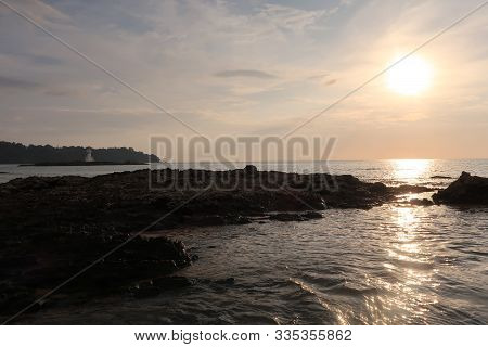Sunset On A Coastal Beach In Phang Nga, Thailand