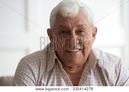 Headshot Closeup Portrait Of Happy Mature Grey-haired Man.