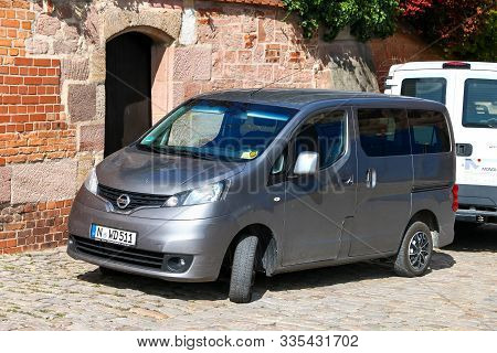 Nuremberg, Germany - September 19, 2019: Grey Passenger Van Nissan Nv200 In The City Street.