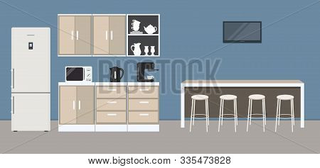 Office Kitchen. Break Room. Dining Room In The Office. There Are Kitchen Cabinets, A Fridge, A Table